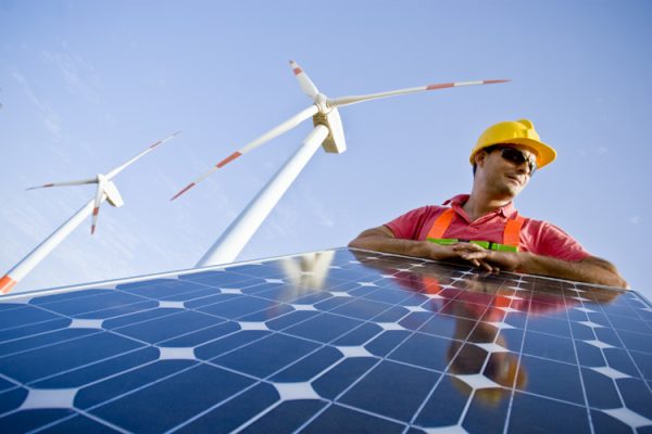 Image of an electrician holding a solar panel. In the background you can see Wind Turbines. Two different technologies to produce energy in a responsible and sustainable way (ISO 100) . All my images have been processed in 16 Bits and transfer down to 8 before uploading.  [url=http://www.istockphoto.com/file_search.php?action=file&lightboxID=7053550] [img]http://www.ll28.com/istock/solarpanel.jpg [/img][/url]